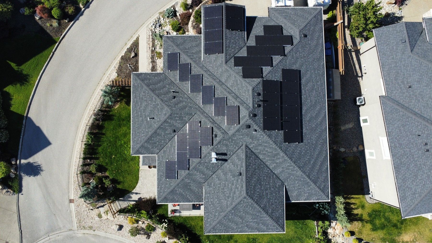 Aerial view of a roof with solar panels